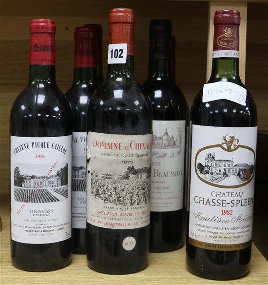 Three Chateau Picque Caillou, 1985, two Domaine de Chevalier 1975, one Ch. Chasse-Spleen, 1982, and one Ch. Beaumont, 1985